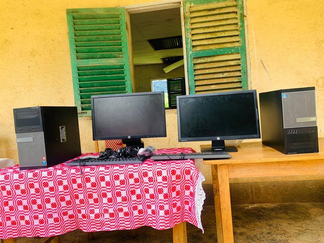 Donated computer workstations set up on a table