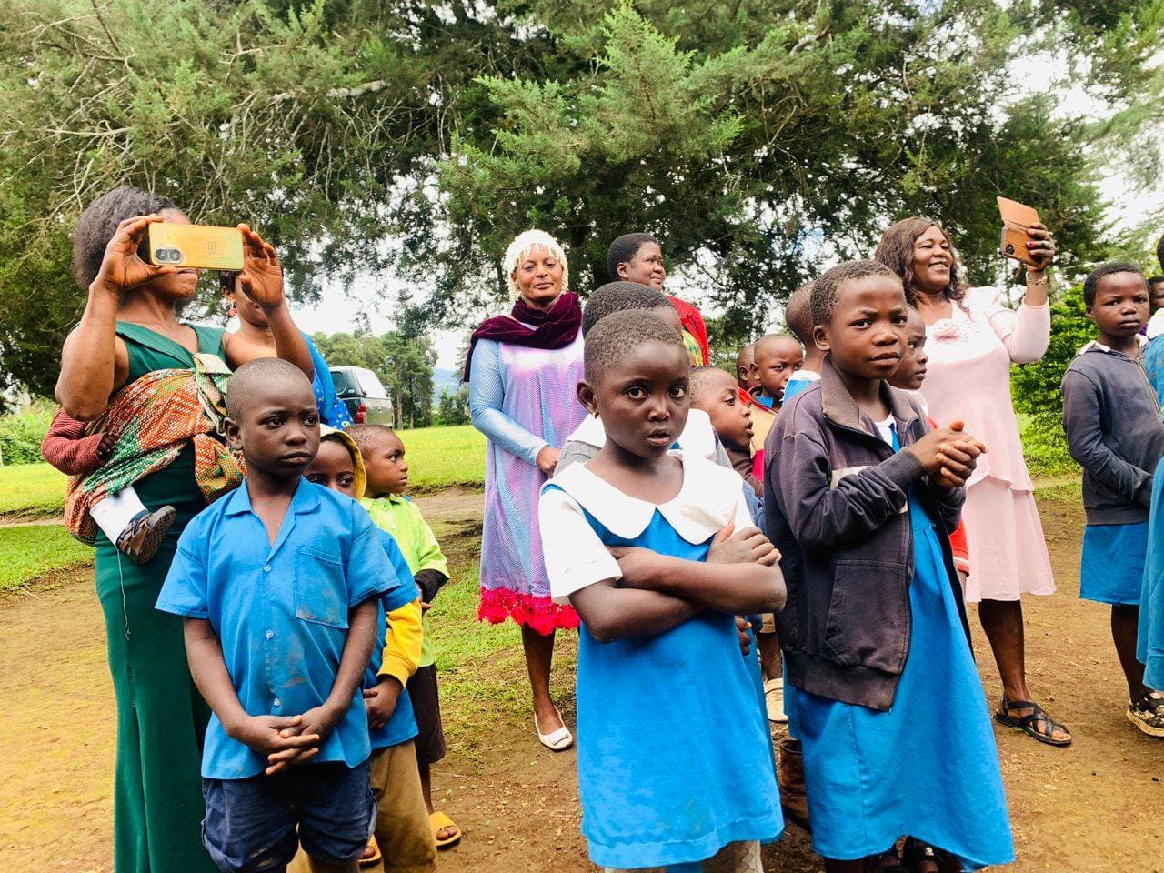 Children watching the donation ceremony
