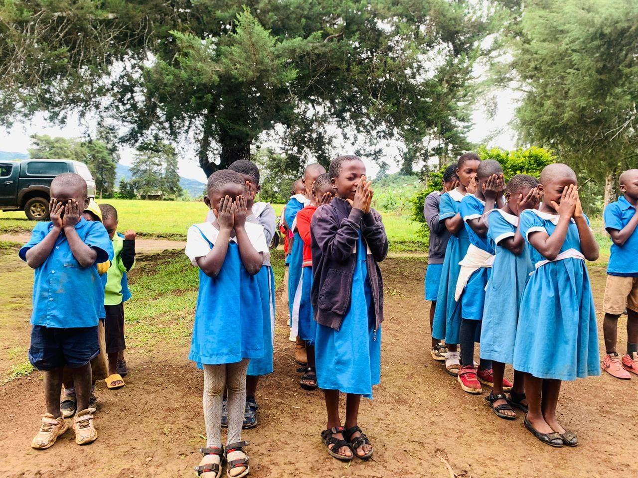 Schoolchildren in uniform during the donation ceremony