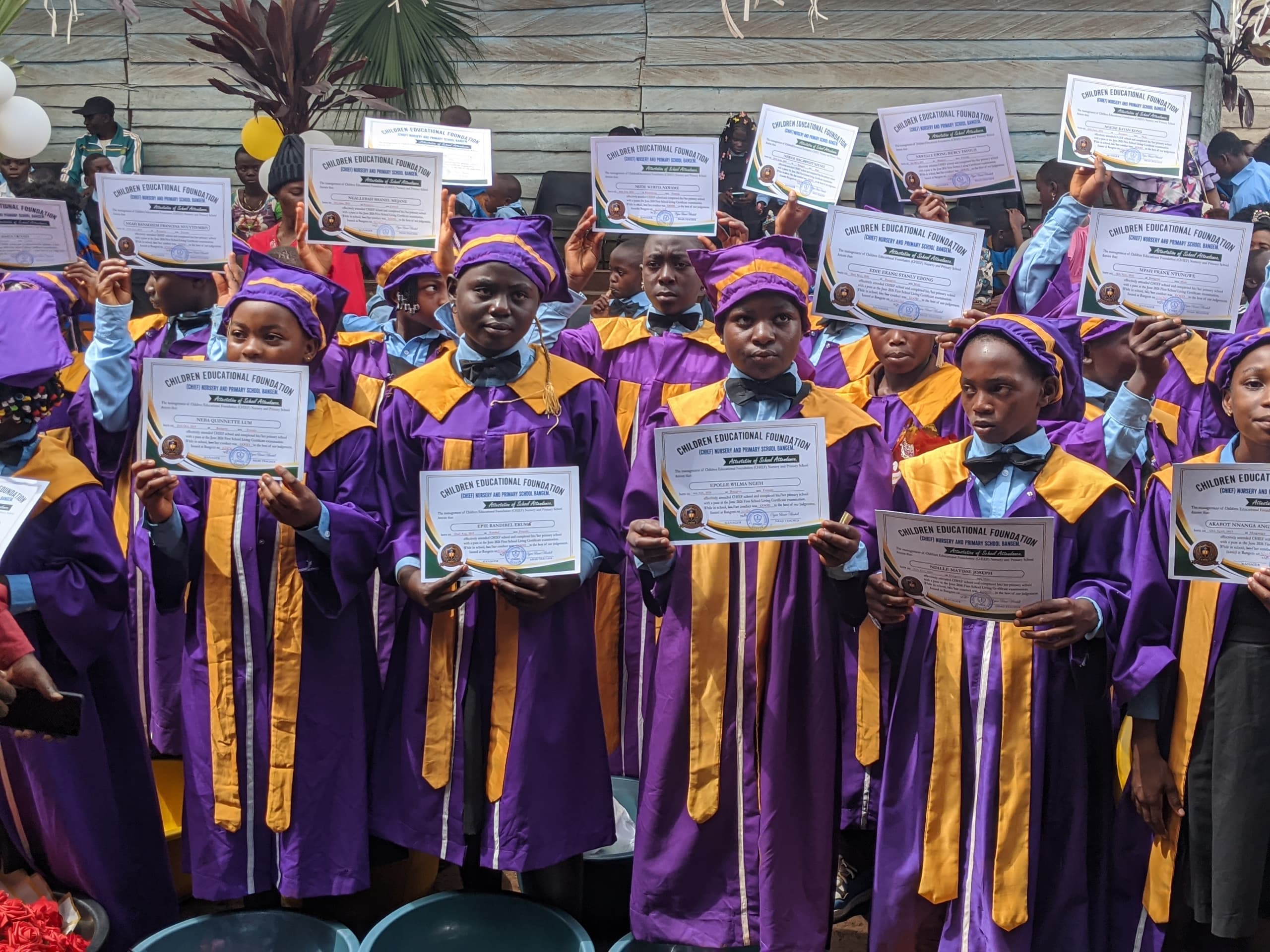 CHIEF pupils proudly holding their attestation certificates